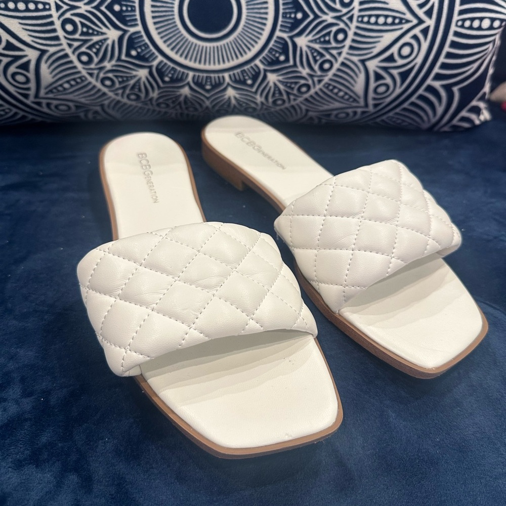 BCBGeneration Quilted Slide Sandals in pure white